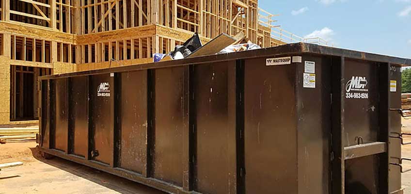 30-yard-mdi-roll-off-dumpster MDi 30 yard roll-off container/dumpster on construction site.
