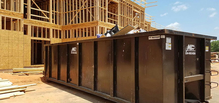 mdi-container-for-construction MDi 30 yard roll-off container/dumpster on construction site.