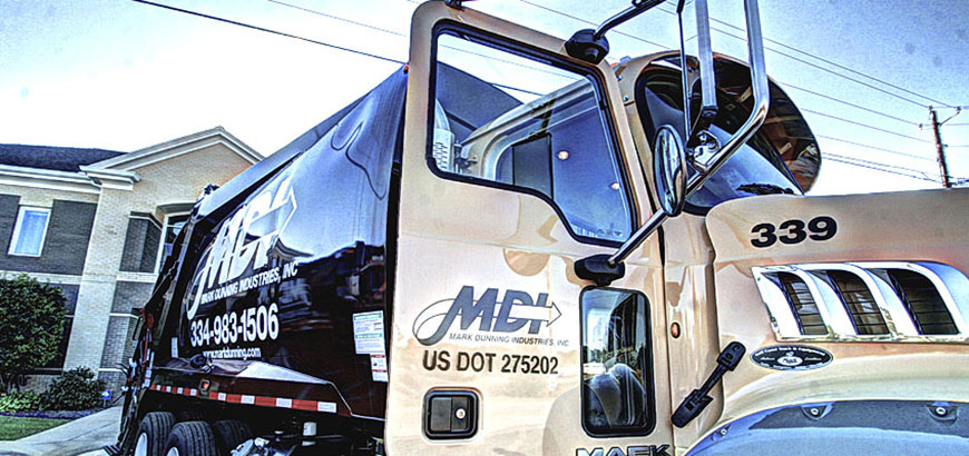 MDI-rear-load-at-hq-870 MDI rearload garbage truck in front of corporate headquarters in Dothan, Al.